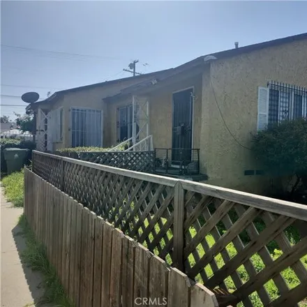 Buy this 4 bed house on 686 East 120th Street in Los Angeles, CA 90059