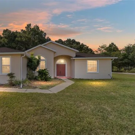 Buy this 3 bed house on 7736 Southwest 103rd Loop in Marion County, FL 34476