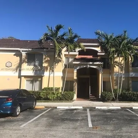 Rent this 2 bed condo on 2421 Northwest 33rd Street in Royal Palm Isles, Broward County