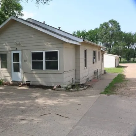 Buy this 4 bed house on Eastgate Towing & Storage Inc. in 2904 East Rice Street, Sioux Falls