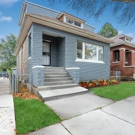 Buy this 4 bed house on 9207 South Merrill Avenue in Chicago, IL 60617
