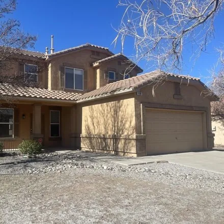 Rent this 4 bed house on 1118 Diamondback Drive Northeast in Albuquerque, NM 87113