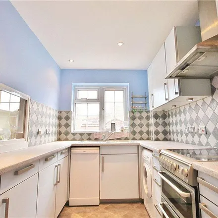 Rent this 3 bed townhouse on Mill Farm Avenue in Charlton, TW16 7DG