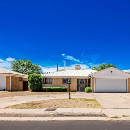 Buy this 3 bed house on 977 Cardenas Drive Southeast in Albuquerque, NM 87108