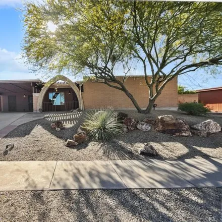 Buy this 4 bed house on 2611 S Pace East Dr in Tucson, Arizona