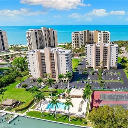 Buy this 2 bed condo on Vanderbilt Landings in Gulfshore Drive, Pelican Bay