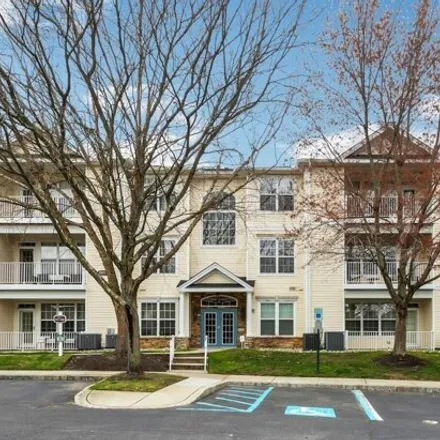 Buy this 2 bed condo on unnamed road in Manalapan Township, NJ