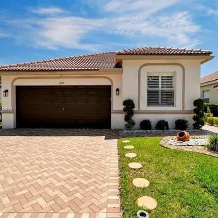Buy this 4 bed house on 1745 Aspen Lane in Weston, FL 33327