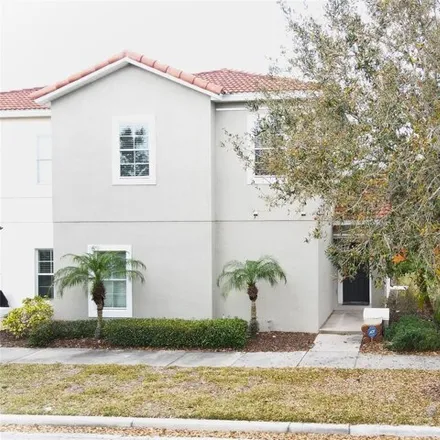 Buy this 4 bed townhouse on 1298 Las Fuentes Drive in Kissimmee, FL 34746