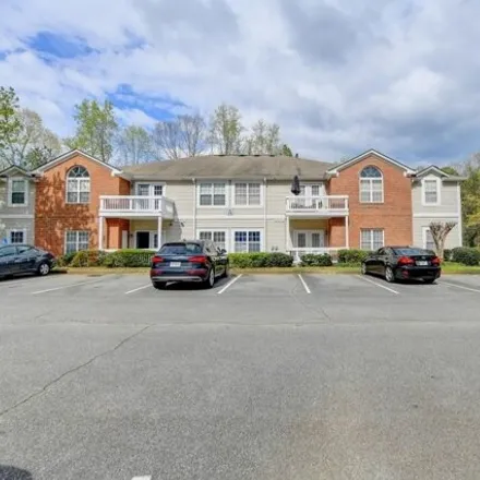 Buy this 2 bed condo on 4022 Orchard Grove in Stone Mountain, DeKalb County