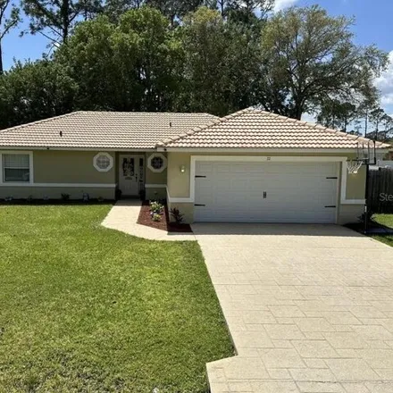 Buy this 3 bed house on 22 Philox Ln in Palm Coast, Florida
