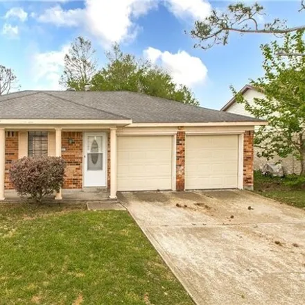 Buy this 4 bed house on 1557 Spanish Oaks Drive in Harvey, Jefferson Parish
