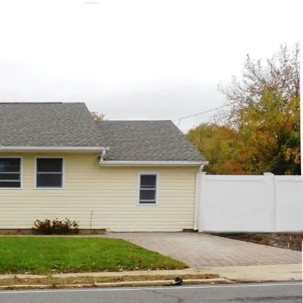 Buy this 4 bed house on 3211 West Bangs Avenue in Hamilton, Neptune Township