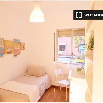 Rent this 3 bed room on Madrid in Instalaciones Deportivas San Vicente de Paúl, Calle de Argüeso