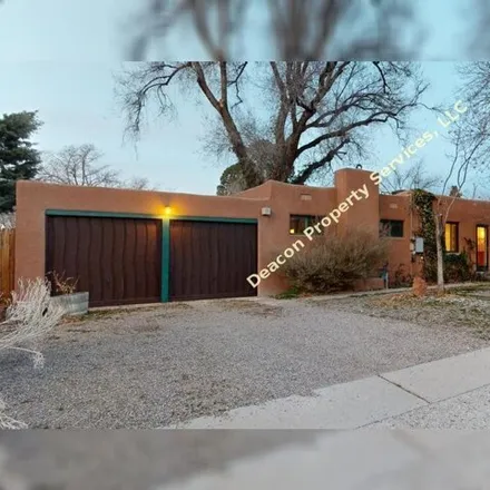 Rent this 3 bed house on 609 Bryn Mawr Drive Northeast in Albuquerque, NM 87131