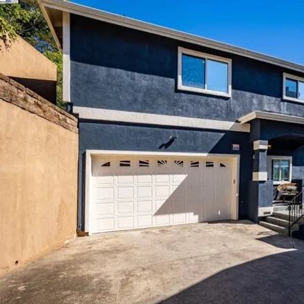 Buy this 4 bed house on 6398 Buena Ventura Avenue in Oakland, CA 94613