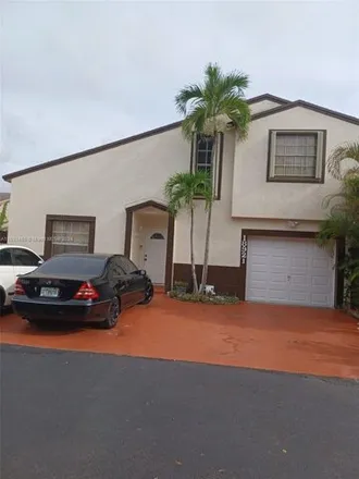 Rent this 3 bed house on 18921 Northwest 63rd Court Circle in Hialeah Gardens, FL 33015