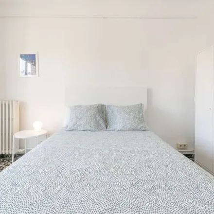 Rent this 6 bed apartment on idk pizza in Carrer del Rosselló, 08001 Barcelona