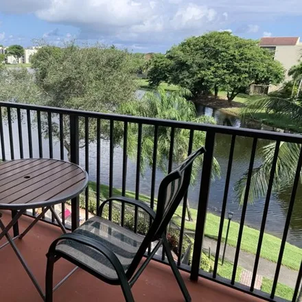 Rent this 2 bed condo on 2105 Lavers Cir Apt 407 in Delray Beach, Florida