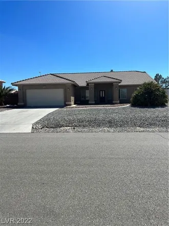 Rent this 4 bed house on 691 West Painted Trails Road in Pahrump, NV 89060