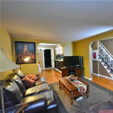 Buy this 3 bed townhouse on 716 Penfield Street in New York, NY 10470