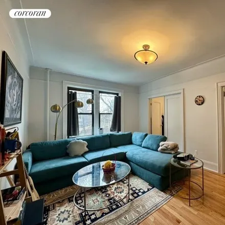 Rent this 2 bed apartment on 42-64 65th Place in New York, NY 11377
