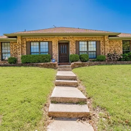 Rent this 4 bed house on 1656 Chesterfield Drive in Carrollton, TX 75007
