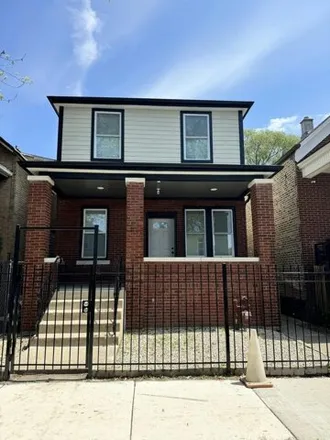 Buy this 4 bed house on 6817 South Artesian Avenue in Chicago, IL 60629