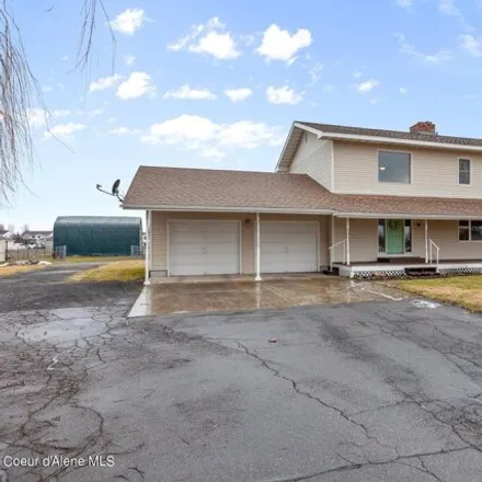 Buy this 4 bed house on North Chateaux Drive in Hayden, ID 83815