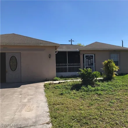 Rent this 4 bed house on 814 Gerald Avenue in Lehigh Acres, FL 33936