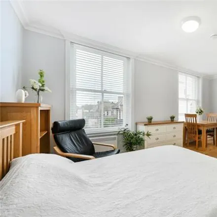 Rent this studio loft on 12 Campden Grove in London, W8 4JQ