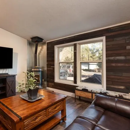 Buy this studio apartment on 19494 Baker Road in Deschutes River Woods, Deschutes County