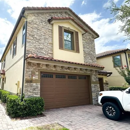 Buy this 3 bed townhouse on 8370 Kelsall Dr in Orlando, Florida