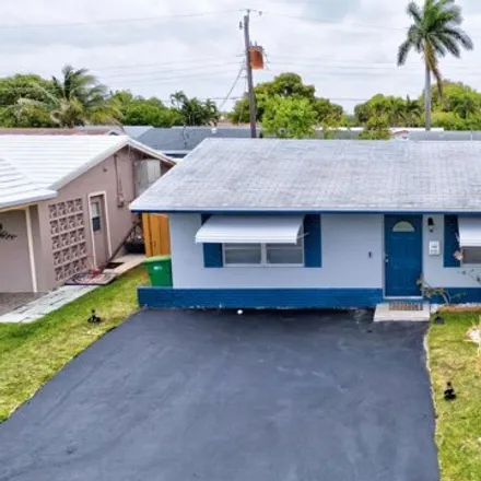 Rent this 2 bed house on 4949 Northwest 27th Way in Tamarac, FL 33309