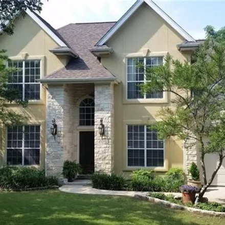 Rent this 4 bed house on 321 Flamingo Drive in Travis County, TX 78734