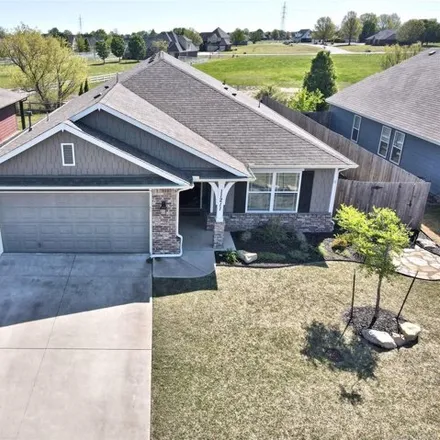 Buy this 4 bed house on 11262 North 148th East Avenue in Owasso, OK 74055