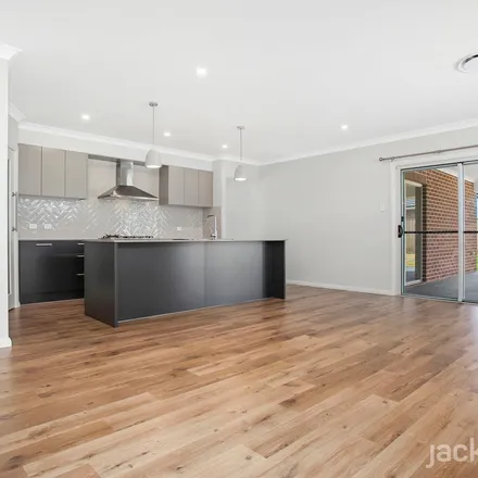Rent this 4 bed apartment on 19 George Cutter Avenue in NSW 2575, Australia