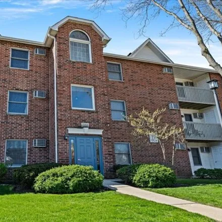 Rent this 2 bed condo on 1334 Cunat Court in Lake in the Hills, IL 60156
