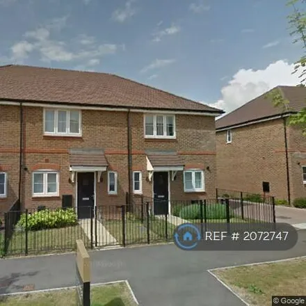 Rent this 2 bed townhouse on Longacres Way in Westhampnett, PO20 2EJ