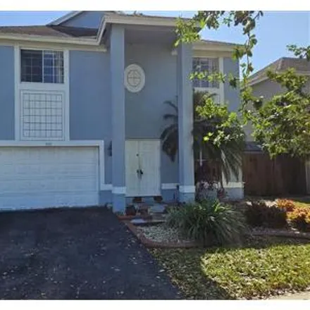 Buy this 5 bed house on 9707 Southwest 14th Street in Pembroke Pines, FL 33025