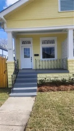 Rent this 3 bed house on 318 South Genois Street in New Orleans, LA 70119