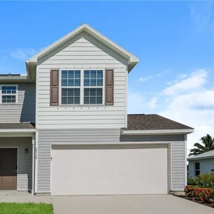 Rent this 3 bed house on 2739 NE 7th Ave in Cape Coral, Florida