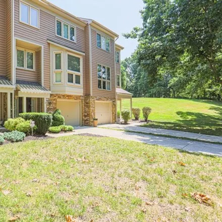 Rent this 4 bed townhouse on 3 Stridesham Ct in Baltimore, Maryland