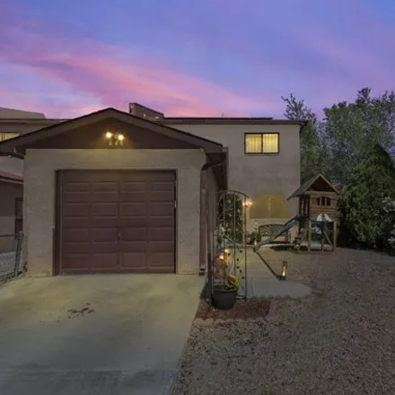 Buy this 3 bed house on 676 Pittard Drive Southwest in Albuquerque, NM 87121