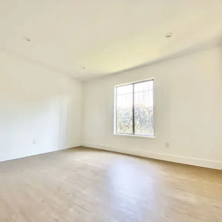 Rent this 3 bed apartment on 1956 New England Street in Los Angeles, CA 90007