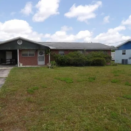 Buy this 4 bed house on 1413 Louisiana Ave in Lynn Haven, Florida