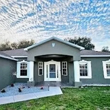 Buy this 4 bed house on 4957 Kirkwood Avenue in Spring Hill, FL 34608