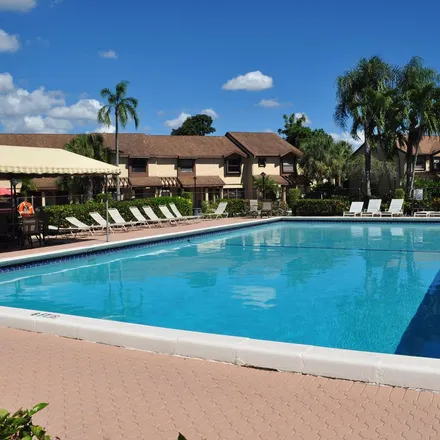 Rent this 2 bed apartment on Cocoplum Circle in Coconut Creek, FL