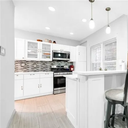 Image 2 - 89-19 91st Street, New York, NY 11421, USA - House for sale