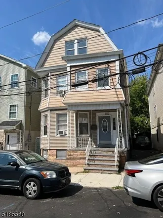 Buy this 8 bed townhouse on 156 Hobson Street in Newark, NJ 07112